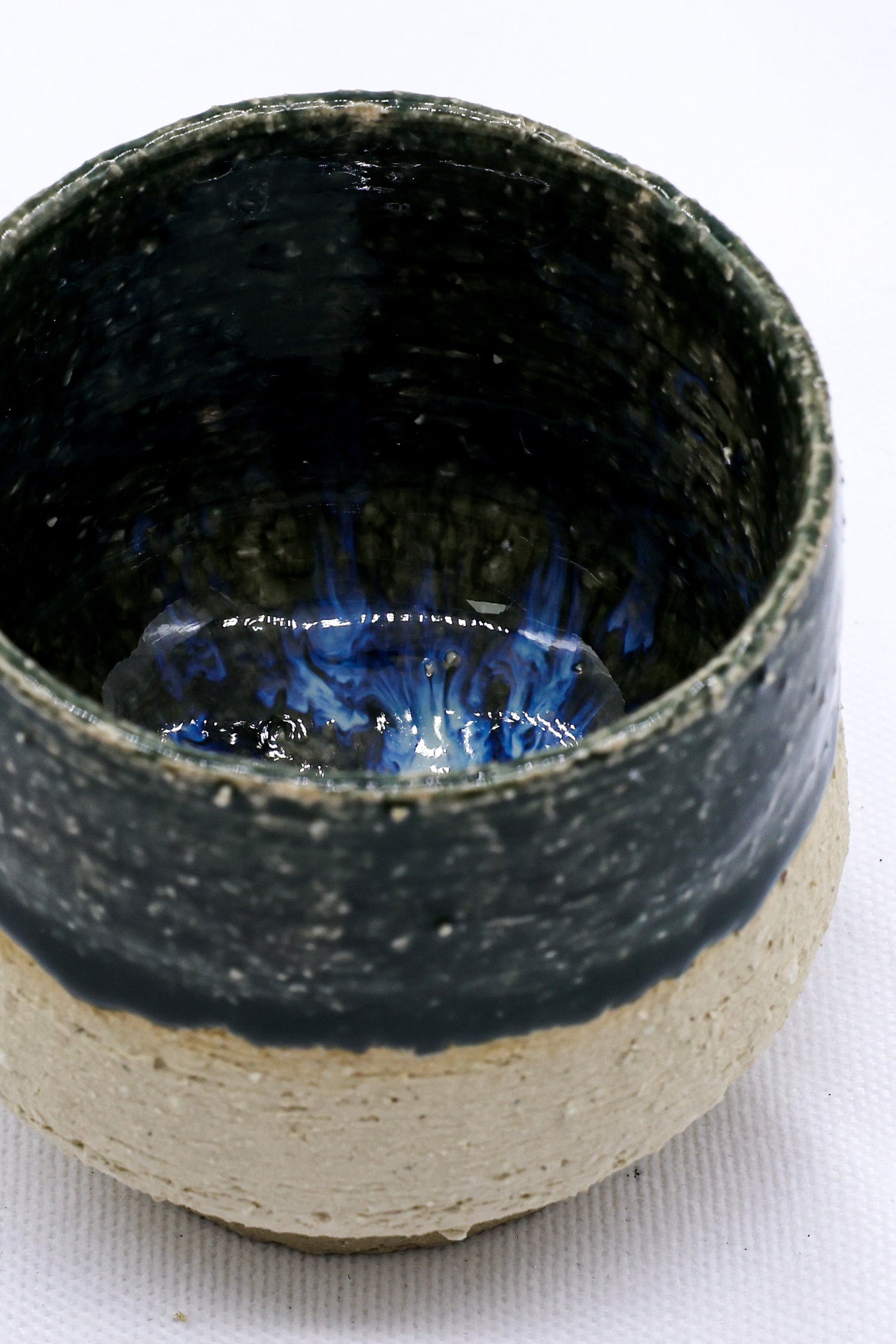 Artisan handmade ceramic coffee mug with natural glaze finish